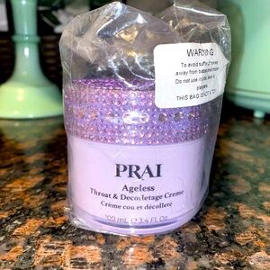 Bejeweled PRAI ageless throat & décolletage creme